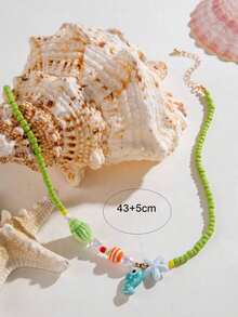 1件波希米亞風趣味陶瓷魚星魚貝殼編織綠色米珠項鍊，適合女性，適用於海灘度假與日常穿著，特別生日禮物（貝殼/星魚為陶瓷材質，尺寸與形狀隨機） - 綠色 - 查看 3