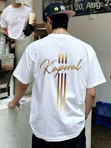 Camisetas de Verano para Hombre Ajustadas, Blancas con Cruz Dorada e Impresión del Logo Kaporal, Perfectas para Vacaciones, Viajes y Playa - Blanco - Ver 1
