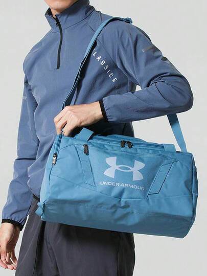 Under Armour UA Undeniable 系列丨防潑水布料男女通用大容量健身訓練手提斜背包旅行桶包圓筒包 48×26×28cm