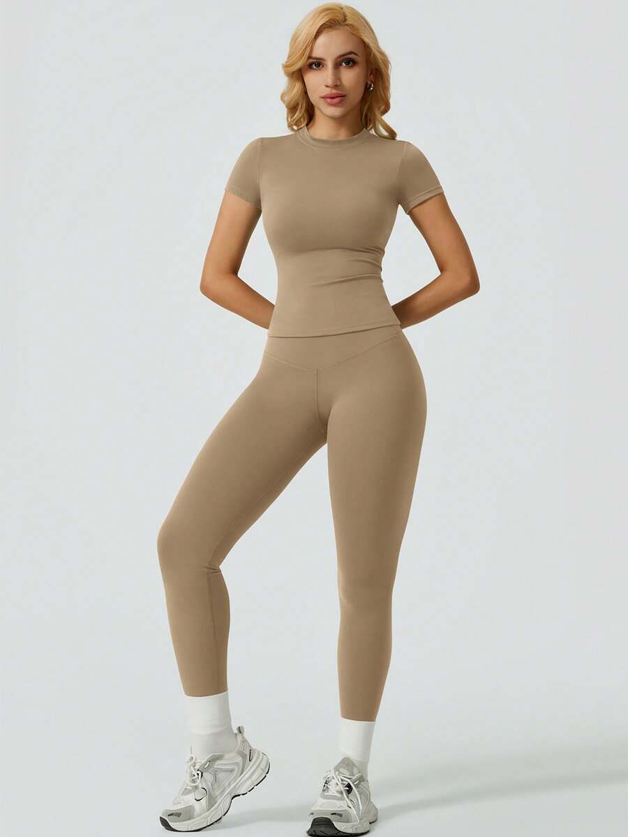 NcmRyu One Set Women's Solid Color Elastic Round Neck Short Sleeve Long Pants Sports Set - Yellow - View 1