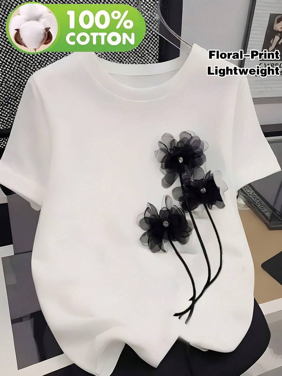 Lässiges Damen T-Shirt aus 100% Baumwolle mit schwarzem Blumenmuster; Relaxed Fit Kurzarmshirt, geeignet für Freizeitkleidung; Weich und atmungsaktiv, - nero - Visualizzare 1