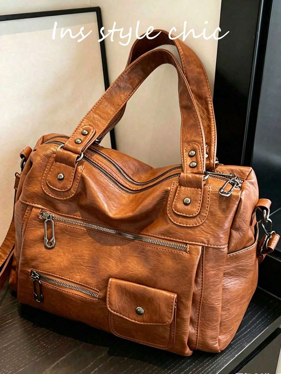 This Large Capacity Tote Bag Features Multiple Zipper Pockets On The Front. Its Spacious Interior Can Accommodate Books And Travel Essentials, Making It An Ideal Choice For Commuters And Students For Daily Commuting, Short Trips, And Shopping. It Is Versatile, Easy To Match With Other Items, And Highly Practical. - Brown - View 1