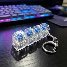 1 pieza Llavero de teclado mecánico con teclas transparentes de cuatro teclas, juguete antiestrés de teclado, accesorio colgante de alivio de estrés, regalo de llavero para mochila - transparente - Ver 11