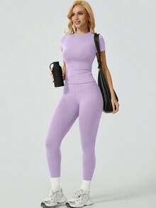 NcmRyu One Set Women's Solid Color Elastic Round Neck Short Sleeve Long Pants Sports Set - Mauve Purple - View 7