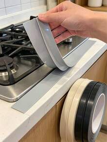 T型爐灶頂耐熱密封條，矽膠填充密封條，防水、防油、防塵嵌入式密封條－耐熱、防水、防污－完美用於密封縫隙並保持檯面清潔 - 查看 5