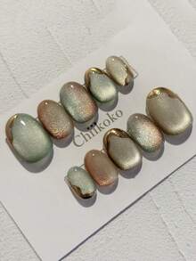 10-Piece/Set Oval Gradient Mint Pink Cat Eye Nail Stickers, Glittery Champagne-Colored Glossy Fake Nails, Wavy Metallic Gold Edges, Minimalist Low-Key Luxury For Spring, Daily Office, Wedding, And Date Nail Set. Handmade Press On Nails - Mint Green - View 1