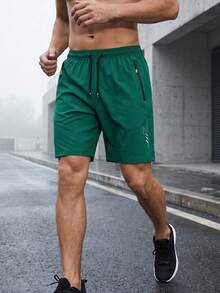 夏季新款男士薄款 5 吋寬鬆運動短褲，附拉鍊口袋，反光印花跑步健身沙灘運動短褲 - 墨綠色 - 查看 8