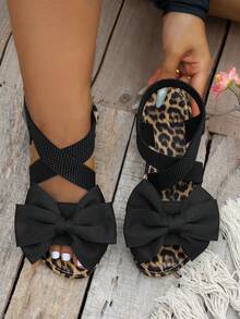 Sandálias rasas casuais para mulher com laço, estampado leopardo e corte largo, elegantes para exterior, praia e férias - Preto - Ver 1