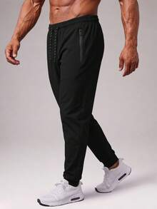 CZRLHYT Celana Jogger Pria, Desain Minimalis dengan Pinggang Elastis, Potongan Longgar, Warna Polos. Ringan dan Sempurna untuk Aktivitas Luar Ruangan di Musim Panas. - Hitam - View 3