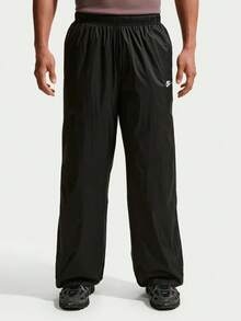 Nike Men's Embroidered Versatile Loose Fit Sports Long Pants For Running, Hiking And Travel - Black - View 1