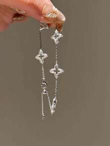1pc New Hollow Four-Leaf Clover Bracelet For Women, Brushed Rhinestone Vintage French Style Plated Four-Leaf Flower Hand Jewelry With Tassel - Silver 1 - View 4