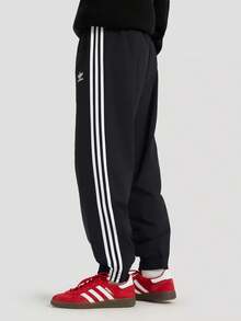 Adidas WOVENFBIRDTP Men's Clover Woven Sports Jogger Pants - Black - View 1
