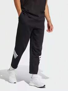 Adidas New Men's Three-Stripe Track Pants, Casual, Suitable For Running, Commuting, Training, And Sports. - Black and White - View 1