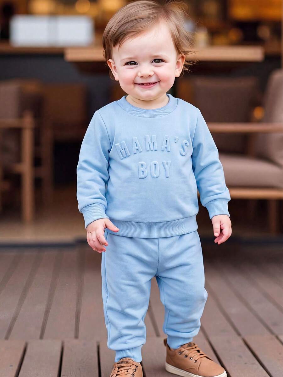 2pcs/Set Baby Boy Fashion Minimalist "MAMA'S BOY" Embossed Long Sleeve Hoodie And Casual Solid Color Elastic Waist Cuffed Pants Set, Spring/Autumn - Blue - View 1
