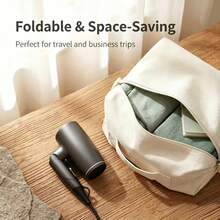 Foldable High-Power Hair Dryer With Strong Airflow. Features 2 Wind Speeds And 4 Heat Settings For Fast Hair Drying And Styling. Built-In Auto Overheat Shut-Off Protection, Comes With Detachable Nozzle. Ideal For Home And Travel Use. - Dark Grey - View 11