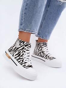 Zapatillas deportivas elegantes para mujer con plataforma gruesa de cebra y un parche dorado y blanco - Blanco - Ver 2