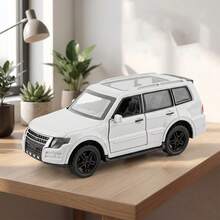 Mô hình xe Pajero hợp kim 1:32 xe địa hình SUV hai màu đen trắng, cửa mở được, vật trang trí xe mô phỏng chân thực - Nhiều màu - Xem 5