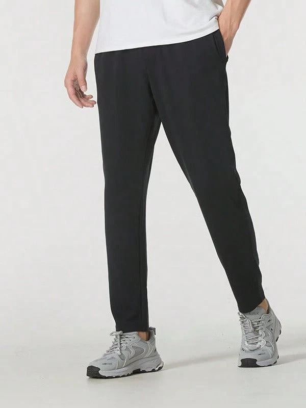 Under Armour Men's Lightweight, Water-Repellent, Breathable, Slim-Fit, Straight-Leg, Stretch, Quick-Drying Sports Pants - Black - View 1