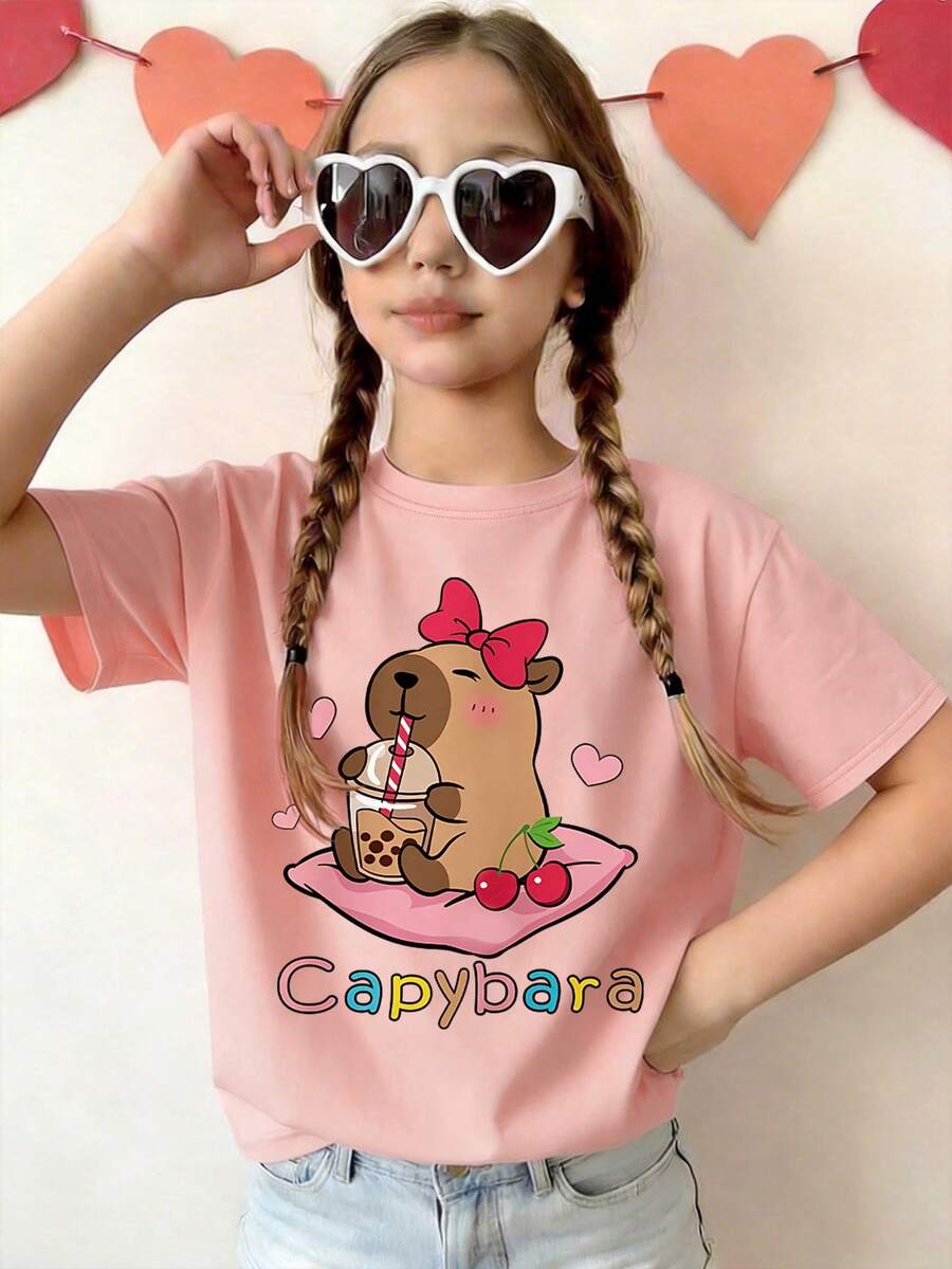 This Apricot Casual Crew Neck T-Shirt Is Designed For Girls And Features A Creative Capybara Peach Pattern, Making It A Perfect Choice For Every Little Girl's Wardrobe. - Pink - View 1