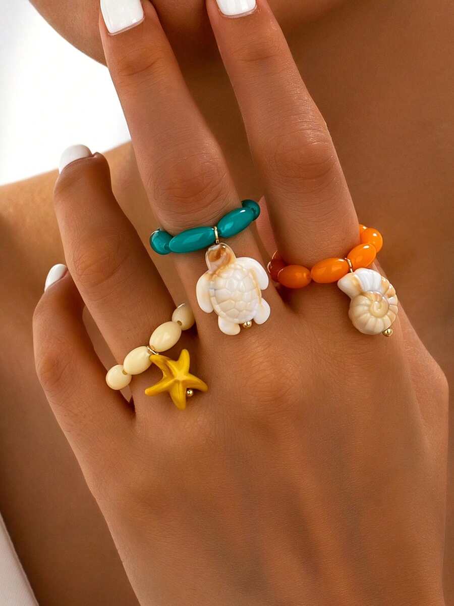Juego de 3 piezas/Set de anillos elásticos con cuentas estilo océano para vacaciones en la playa, anillos de dedo con cuentas redondas de resina de colores con tortuga, estrella de mar y caracola, accesorios para fotos de playa - Multicolor - Ver 1