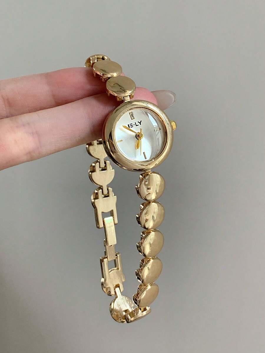 Este reloj de cuarzo con patrón de bambú cuadrado en oro/plata es adecuado para el uso diario, y también es un regalo perfecto para cumpleaños y Navidad. - Dorado - Ver 1