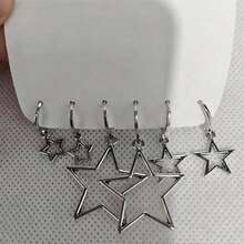 Set de 3 pendientes de clip con estrella hueca plateada. Adoptando un diseño minimalista, con diferentes tamaños, adecuado para varios estilos. Diseño exquisito, versátil para uso diario, evitando conflictos de estilo. - Plateado - Ver 3