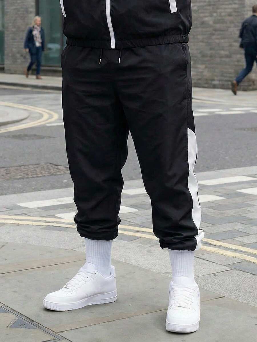 Plus Size Men's Side Colorblock Jogger Sweatpants, Elastic Waist Drawstring Loose Fit Windproof Casual Long Pants - Black - View 1