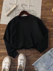 1pc Tween Girl Pure Black All-Match Crew Neck Sweatshirt, Loose Fit Solid Color Long Sleeve Pullover, Skin-Friendly Breathable Ribbed Cuffs Casual Top, Versatile Athleisure Light Sporty Style For Spring Autumn Winter, Commuter Base Layer - Black - View 4