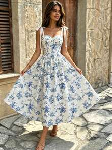 Este elegante vestido midi presenta un romántico estampado floral, escote halter con lazo, escote corazón, cintura ajustada y falda amplia. Perfecto para primavera, verano - Azul - Ver 9