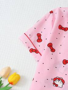 授權 2 件組 春夏女款 Sanrio Hello Kitty 印花翻領短袖鈕扣口袋上衣與蝴蝶結短褲睡衣套裝居家休閒服 - 粉色 - 查看 4