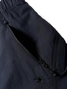 CAMEL CROWN Men's Outdoor Casual Long Pants, Windproof, Wear-Resistant, Water-Repellent, Loose Wide Leg Slimming Sports Casual Pants - Phantom Black - View 4