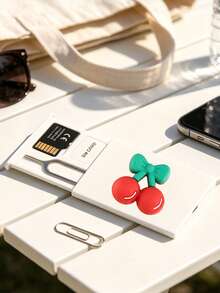 حامل بطاقة SIM ثلاثي الأبعاد مقاوم للغبار والخدش بتصميم الكرز، فتحة دبوس بطاقة SIM، يأتي مع دبوس بطاقة SIM. صندوق تخزين بطاقة SIM محمول بتصميم الكرز اللطيف، حامل بطاقة الهاتف، صندوق تخزين بطاقة SIM وبطاقة SD، صندوق تخزين للسفر، مدمج وخفيف الوزن، مقاوم للفقدان ومتين، مقاوم للصدمات ومتين، مناسب للهواتف الذكية والأجهزة اللوحية والأجهزة الأخرى، يمكن تخزين بطاقة SIM/دبوس بطاقة SIM، خيار مثالي لتخزين بطاقات SIM الاحتياطية عند تغيير أرقام الهاتف، أيضًا هدية رائعة. - متعدد الألوان - مشاهدة 3