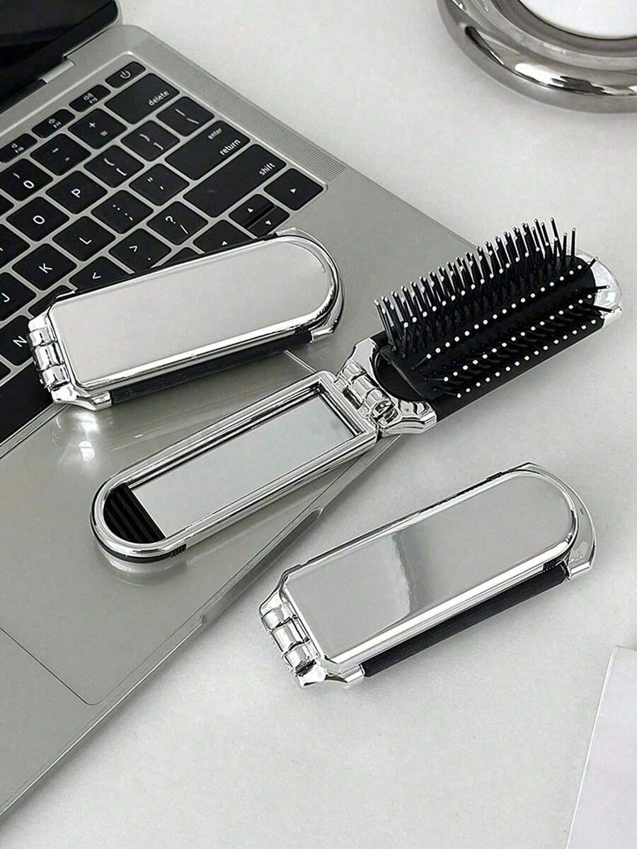 Un peine plateado electrochapado brillante con diseño plegable, un pequeño espejo, compacto y portátil - Plateado - Ver 1
