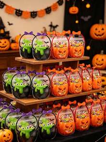 10 pièces/1 pièce Sacs cadeaux de bonbons en forme de chaudron d'Halloween, sacs cadeaux de fête avec poignée transparente, Halloween Truc ou Traite, convient pour les collations, les desserts et les fournitures de fête, décoration d'Halloween pour la maison, décoration de chambre, cadeaux d'Halloween, cadeaux de fête - Plusieurs styles - Voir 6