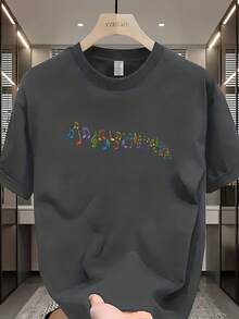 A Round-Neck Short-Sleeve T-Shirt Featuring A Colorful Music Note Pattern Print On The Front. The Vibrant Note Elements Convey A Lively, Music-Related - 黑色 - 查看 6