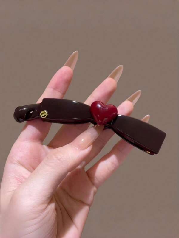 1 pieza Pinza de plátano con lazo en forma de corazón para coleta, elegante pinza minimalista para recoger el cabello en la parte posterior de la cabeza de forma segura y holgada, accesorio para el cabello vertical, adecuado para uso diario, fiestas, desplazamientos, vacaciones y otras ocasiones. Se puede usar para peinar el cabello, crear peinados o como accesorio decorativo durante el lavado de la cara, el baño y el maquillaje. Combina perfectamente con la ropa y otros accesorios.