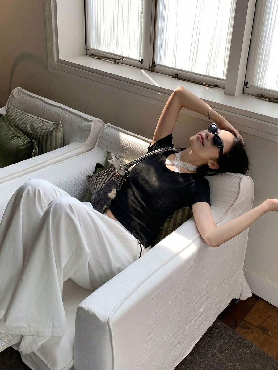 黑色蕾絲掛脖針織上衣,不對稱下擺,性感外穿或內搭穿搭 - 黑色 - 查看 1