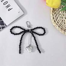 1個白色珍珠蝴蝶結鑰匙圈裝飾，適用於包包、手機，女性時尚配件 - 彩色 - 查看 4