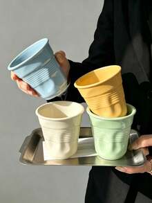 1pc Ins Style Pleated Twisted Ceramic Mug, Niche Coffee Cup For Home Afternoon Tea Milk Tea, Minimalist Solid Color Water Cup, Creative Textured Design Cup, Versatile Drinking Cup, Couple/Best Friend Matching Gift, Home/Office Breakfast Beverage Cup, Photo-Worthy Tableware, Multi-Color Options, Versatile Home Decor Gift - Multicolor - View 1
