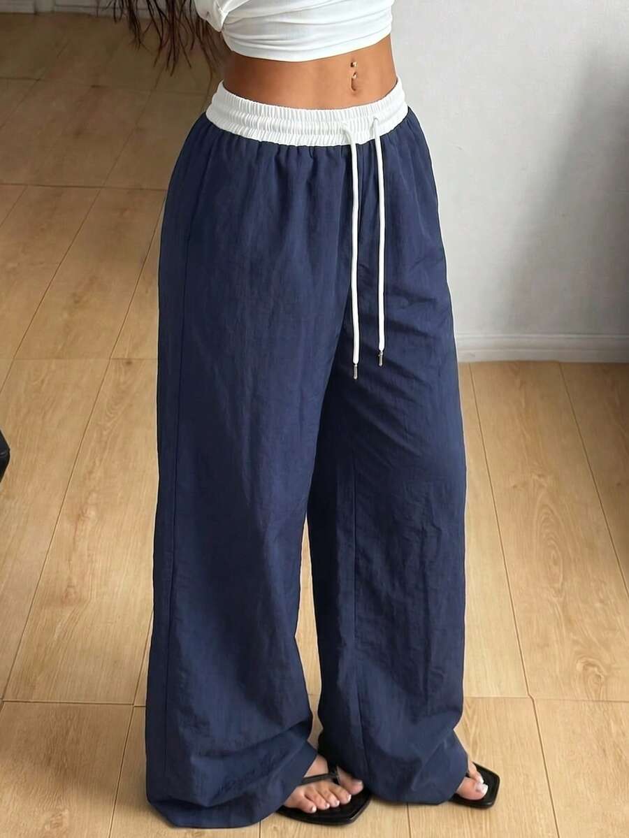 女款日常通勤彈性腰抽繩可調直筒口袋長褲，時尚休閒運動風，春夏秋運動穿搭