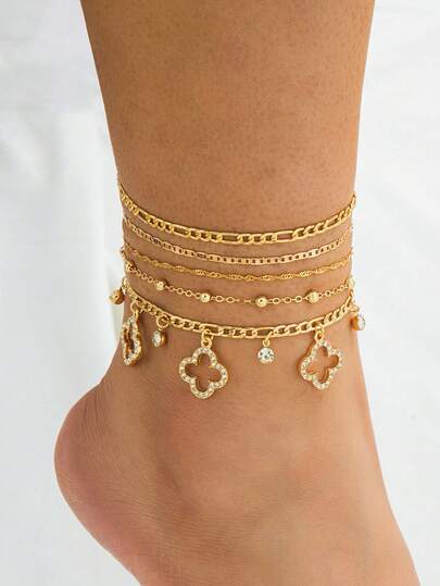 Set de 4 tobilleras elegantes de lujo para vacaciones de verano, estilo bohemio, con borlas, colgante de trébol hueco brillante dorado para mujer
