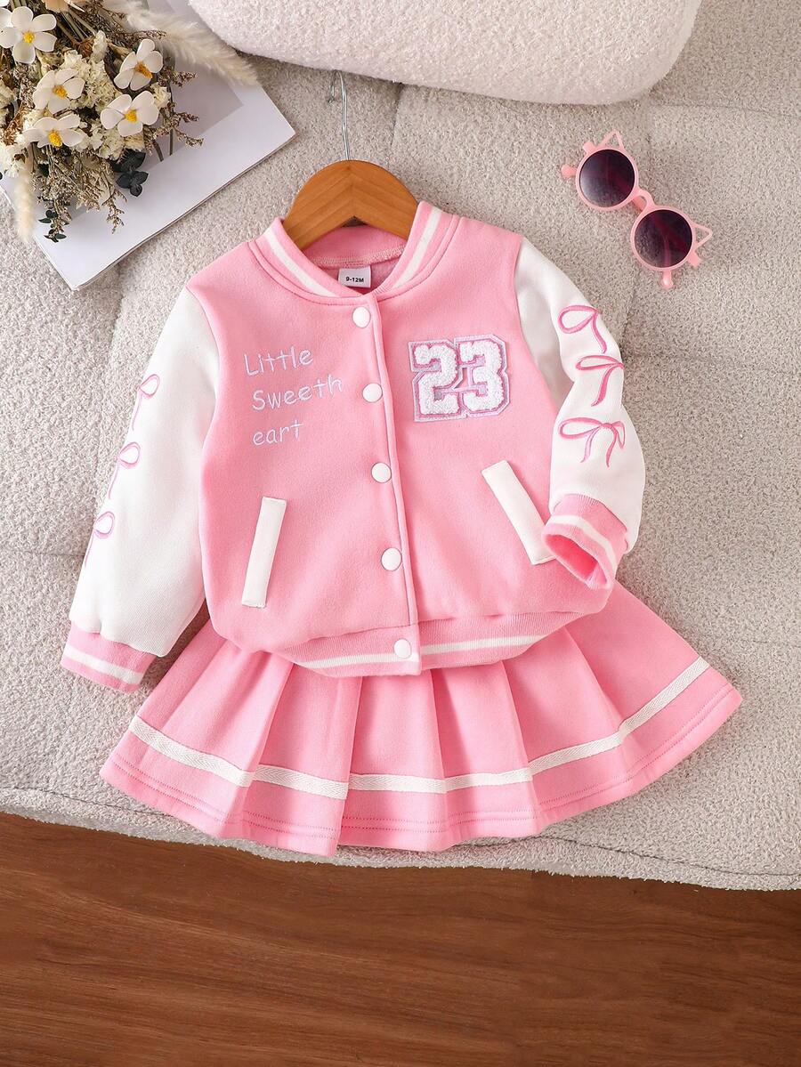 MYVLNA 2pcs/Set Baby Girl Pink & White Colorblock Baseball Jacket With Pink Pleated Skirt, Letter Embroidery & Number Patch, Bow Sleeve Decor, Striped Collar & Cuffs, Button Front, Sweet Preppy Style - Pink - View 1