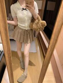 韓系甜美娃娃領鏤空短袖針織開襟外套女款，夏季蕾絲荷葉邊蝴蝶結修身短版精緻上衣 - 杏色 - 查看 2