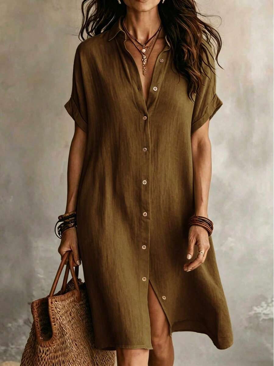 女款休閒象牙色梭織布料襯衫洋裝，領口設計、短袖、前襟鈕扣細節、不對稱下擺、及膝長度，優雅夏季款
