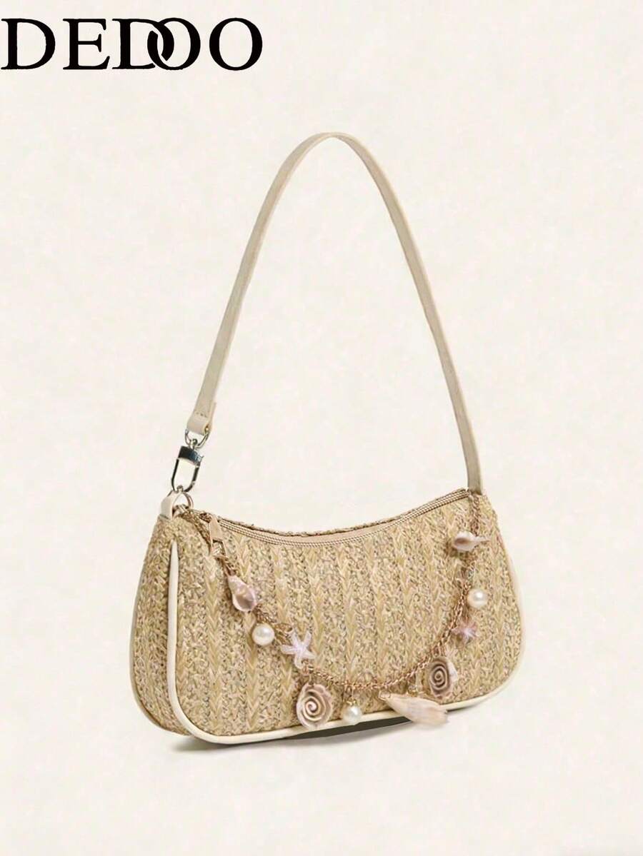 Dedoo 这款2026春夏度假风草编单肩包采用链条肩带，融入海洋元素，散发清新简约的气息，非常适合搭配沙滩裙、亚麻衬衫和牛仔短裤，打造休闲夏日造型。它可用于日常出行、购物和其他场合。