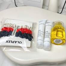 Olaplex Strength + Shine Essentials Force + Brillance 護髮套組，包含 No.4 洗髮精、No.5 護髮素、No.7 護髮油與髮圈 - Shampoo+Conditioner+Bonding Oil+Hair Scrunchies - 查看 3