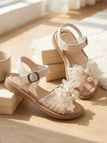 Sandalias de moda con lazo de cinta beige para niñas verano 2026, zapatos elegantes de princesa para niñas de 3-10 años, zapatos planos cómodos y transpirables con punta abierta, zapatos infantiles con cierre de gancho y bucle ajustable fáciles de poner y quitar, zapatos ligeros y versátiles duraderos para estudiantes, adecuados para la escuela, cumpleaños, bodas y uso diario! - Beis - Ver 5