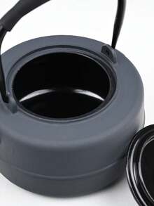 A Japanese-Style Cast Iron Teapot, Suitable For Brewing Tea Over A Fireplace, Perfect For Home Use As A Tea Set. It Features An Open Flame And A Handle, And Comes In Various Textured Designs. Sizes Range From 780-1200ml. - Striped Black Iron Kettle (1000ml) - View 4