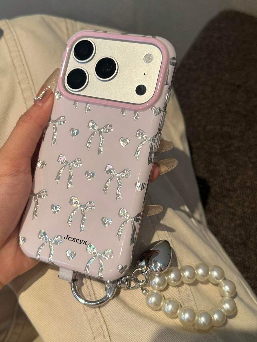 Funda de teléfono de lujo con pantalla completa, lazo, corazón, brillo, asimétrica, con patrón de strass y lentejuelas, color rosa, compatible con iPhone 17 Pro Max, 17 Pro, 16 Pro Max, 15 Pro Max, 13, 14 Pro Max, 16 Plus, 12 Pro Max, 11, con colgante de perla, suave, con purpurina, protectora, regalo - arco amor corazon - Ver 1