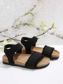 Sandalias planas para niños de color negro mate, tejidas, con una sola correa, cierre de gancho y bucle, suela blanda de corcho y punta abierta - Negro - Ver 4